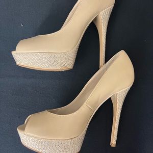 Aldo nude heels with
bedazzled heel